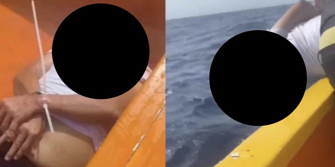 Mediante las plataformas de redes sociales se muestra cómo un hombre, consiente y con las manos atadas, es lanzado al mar desde una embarcación.