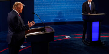 NASHVILLE, TENNESSEE - OCTOBER 22:  President Donald Trump answers a question as Democratic presidential candidate former Vice President Joe Biden listens during the second and final presidential debate at Belmont University on October 22, 2020 in Nashville, Tennessee. This is the last debate between the two candidates before the election on November 3. (Photo by Morry Gash-Pool/Getty Images)
