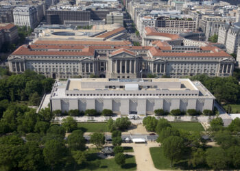 Aerial view of the Museum of Natural History and the Federal Triangle. The museum's collections total over 126 million specimens of plants, animals, fossils, minerals, rocks, meteorites, and human cultural artifacts. It is the second most popular of all of the Smithsonian museums and is also home to about 185 professional natural history scientists Ñ the largest group of scientists dedicated to the study of natural and cultural history in the world.