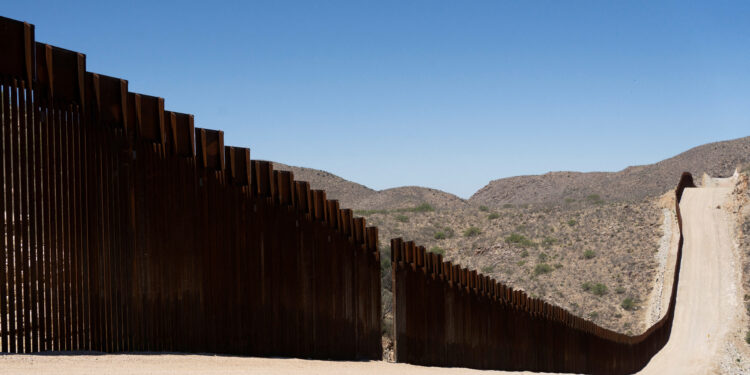 FILE PHOTO: A gap in the U.S.-Mexico border fence near Sasabe, Arizona, U.S., May 10, 2022. REUTERS/Rebecca Noble/File Photo