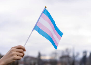 Transgender Flag hold in the sky