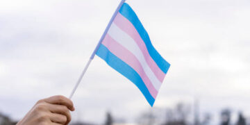Transgender Flag hold in the sky