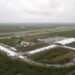 Work progresses on a new migrant detention facility dubbed "Alligator Alcatraz," at Dade-Collier Training and Transition facility in the Florida Everglades, Friday, July 4, 2025, in Ochopee, Fla. (AP Photo/Rebecca Blackwell)