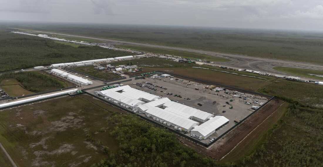 OCHOPEE, FLORIDA - JULY 4: In an aerial view from a helicopter, the migrant detention center, dubbed "Alligator Alcatraz," is seen located at the site of the Dade-Collier Training and Transition Airport on July 4, 2025 in Ochopee, Florida. U.S. President Donald Trump was present at the opening of the 5,000-bed facility, located at an abandoned airfield in the Everglades wetlands, as part of his expansion of undocumented migrant deportations. (Photo by Alon Skuy/Getty Images)
