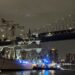 New York City Fire and Police department boat respond to a Mexican Navy vessel that crashed into the Brooklyn Bridge on May 17. Photographer: Myles Miller/Bloomberg