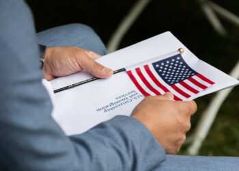 The U.S. Citizenship and Immigration Services (USCIS) welcomed 24 new citizens during a naturalization ceremony at  the Springfield Armory National Historic Site on the grounds of Springfield Technical Community College Friday morning, Sept. 17, 2021. (Hoang ‘Leon’ Nguyen / The Republican)