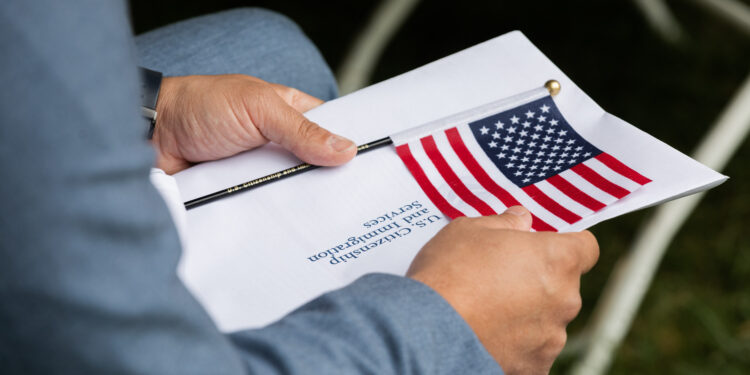 The U.S. Citizenship and Immigration Services (USCIS) welcomed 24 new citizens during a naturalization ceremony at  the Springfield Armory National Historic Site on the grounds of Springfield Technical Community College Friday morning, Sept. 17, 2021. (Hoang ‘Leon’ Nguyen / The Republican)
