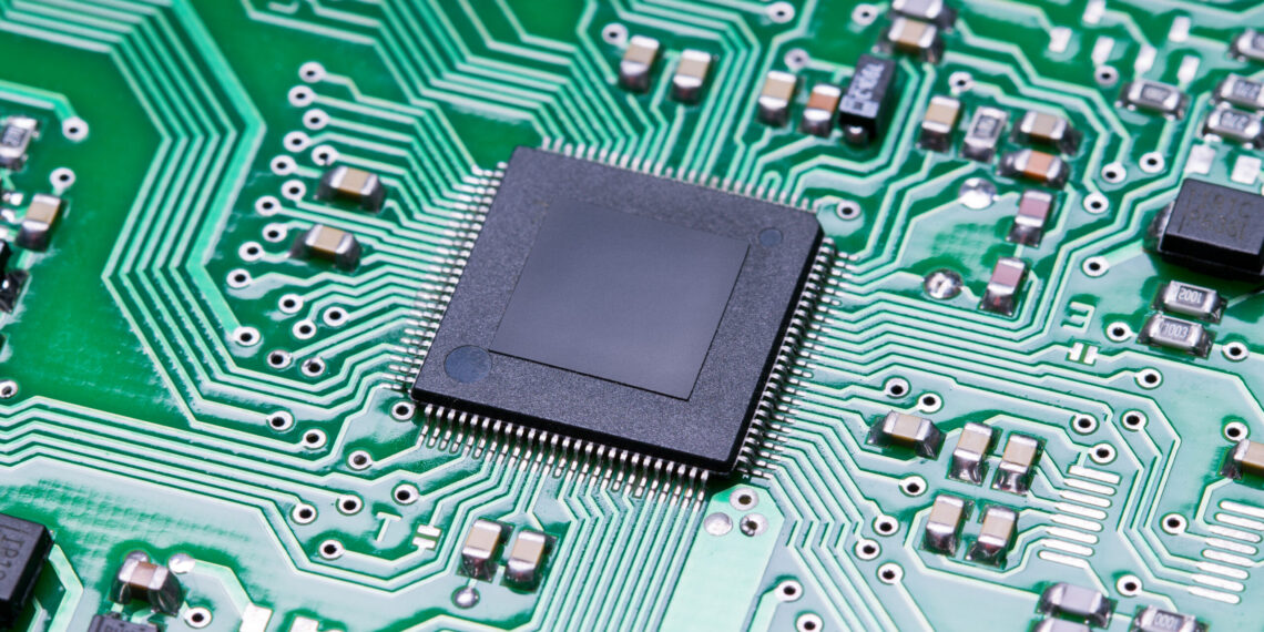 Close up microchip of a printed circuit board