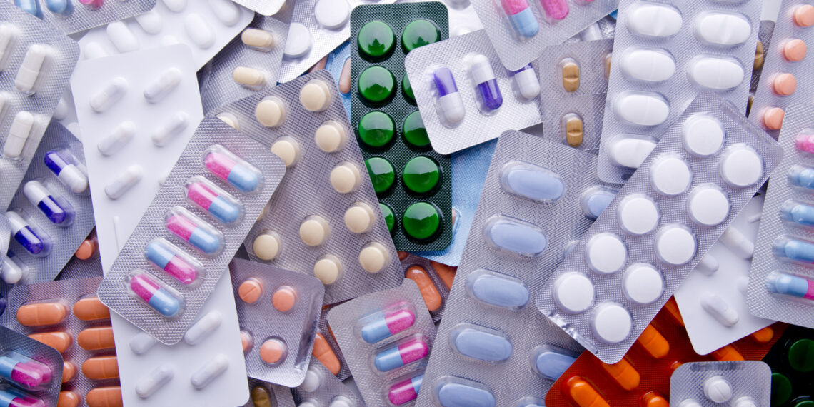 Colorful Assortment Of Medicine Tables & Capsules.
