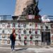 Araceli Hernandez, 50, a housewife who lives in San Pedro Tlaquepaque and is looking for two of her missing sons, looks at at the Glorieta de los Desaparecidos (Roundabout of the Disappeared), in Guadalajara, Jalisco state, Mexico, on May 1, 2022. - While most Mexicans will celebrate Mother's Day on May 10, 2022, thousands of women will take to the streets or will continue searching for their disappeared children. (Photo by ULISES RUIZ / AFP)
