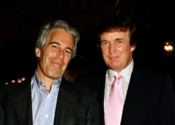 Portrait of American financier Jeffrey Epstein (left) and real estate developer Donald Trump as they pose together at the Mar-a-Lago estate, Palm Beach, Florida, 1997. (Photo by Davidoff Studios/Getty Images)