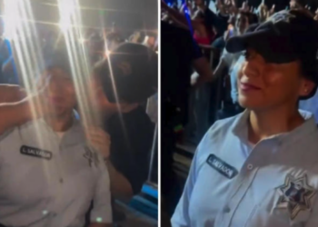 nrique Iglesias besa a policía