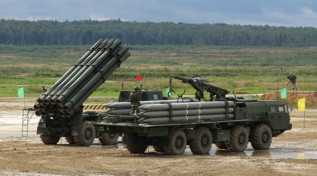 Soviet MLRS Smertch (9A52-2) in background and transporter-loader 9T234-2 with 12 rockets demonstrated at ARMY'2016 International military technical forum, Alabino range, Russia