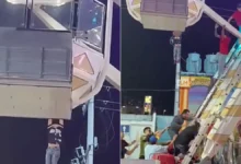 Menor colgando de una rueda de la fortuna en una feria de Torreón