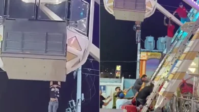 Menor colgando de una rueda de la fortuna en una feria de Torreón